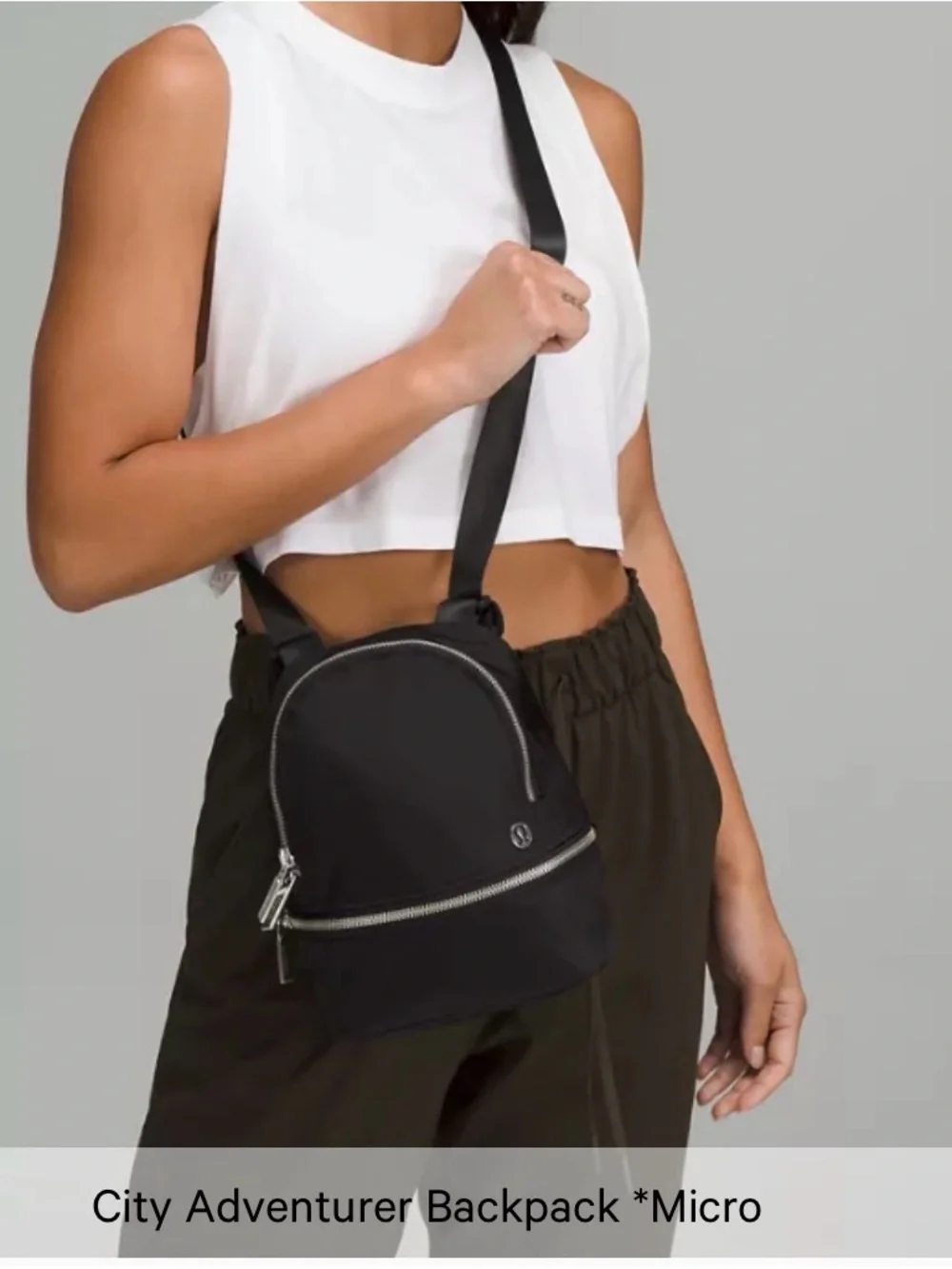 Lululemon City Adventurer Backpack Micro 3L in Black with Gold hardware.